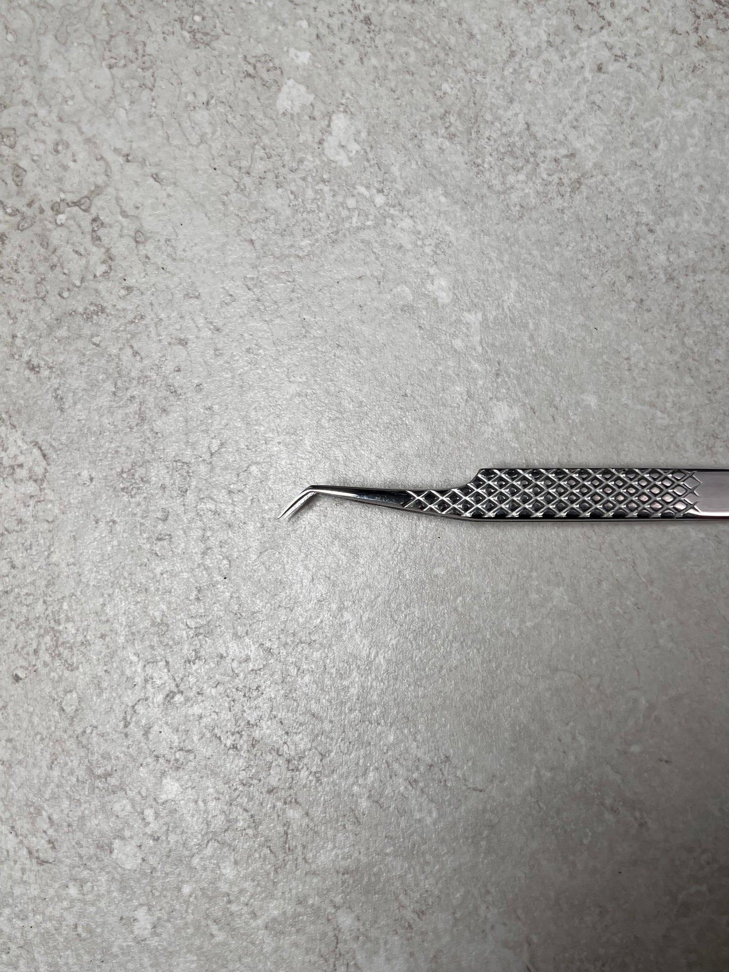 Curved Isolation Tweezer